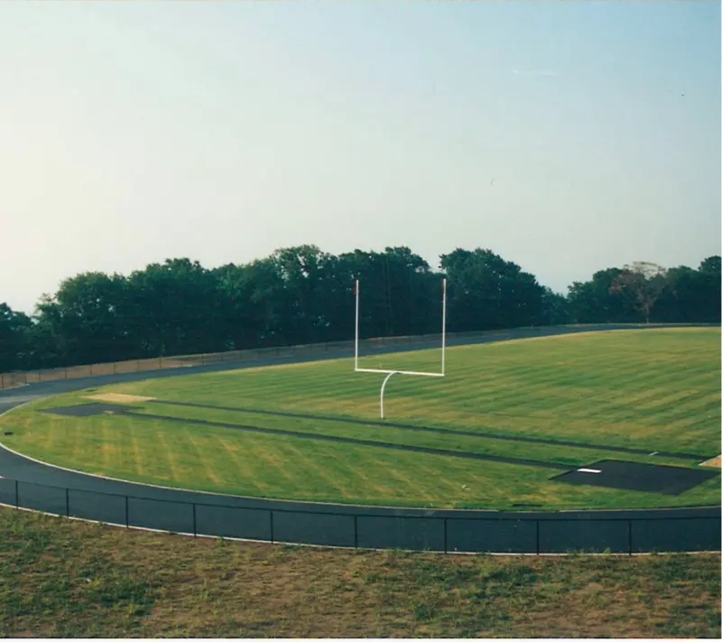 Finished athletic field with goalpost, after Grabowski earthwork.