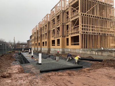 Storm chamber install in the open trench at Clarus Glen Ridge.